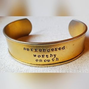 Gold bracelet "surrendered worthy enough"